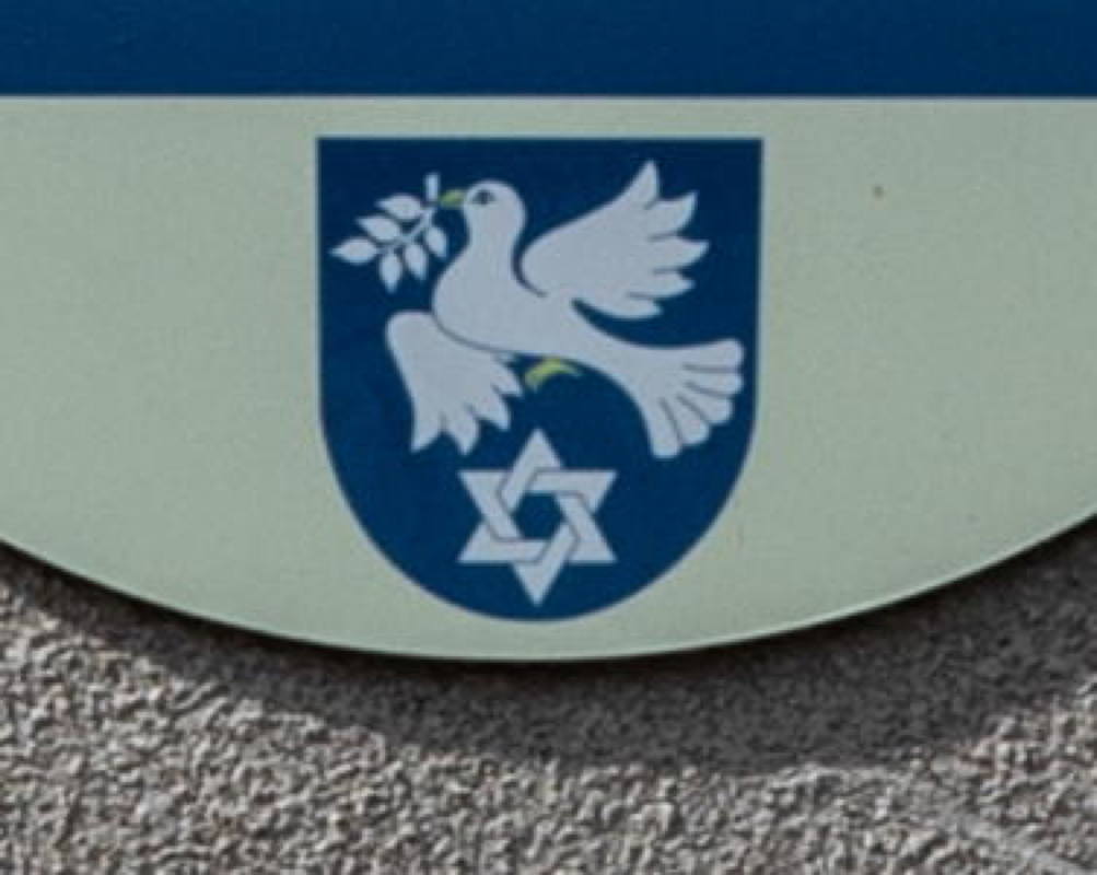 New town symbol recognizing 50% Jewish population before Shoah